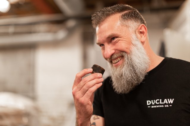 Scott gives a tour in the distillery.