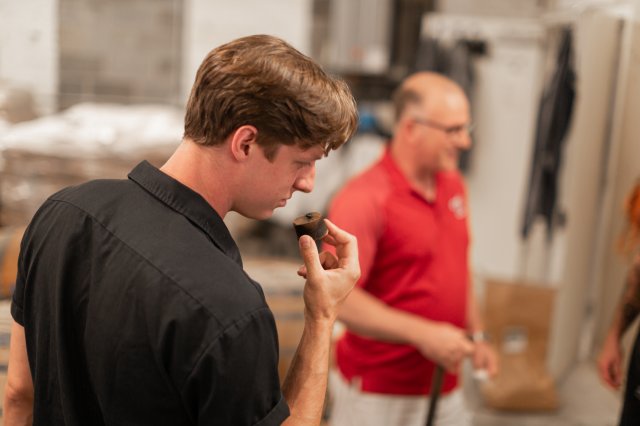 Scott gives a tour in the distillery.