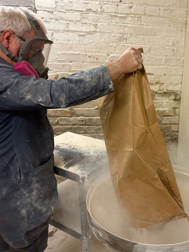 Image of individual making whisky.
