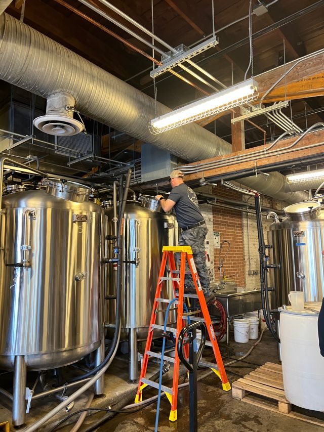 Image of individual making whisky.