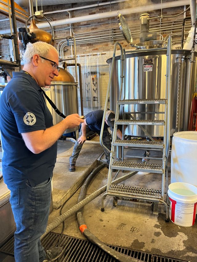 Image of individual making whisky.